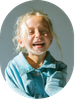 Smiling child wearing a denim jacket