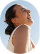 Woman smiling in the sunlight