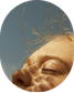 Woman resting with her eyes closed in the sunlight