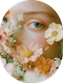 Woman surrounded by flowers